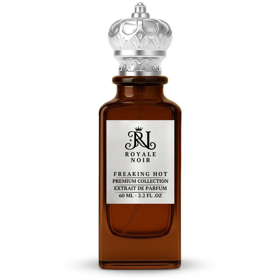 Freaking Hot Extrait De Parfum Premium Collection by Royale Noir – Elegant Fragrance in Transparent Brown Bottle With Silver Label And Silver Crown Cap.