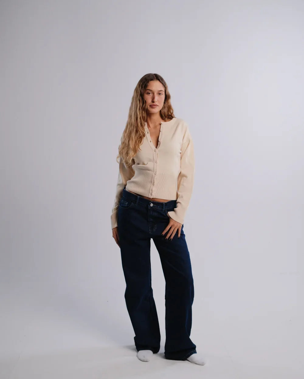 Fitted Cardigan in Cream — studio photograph