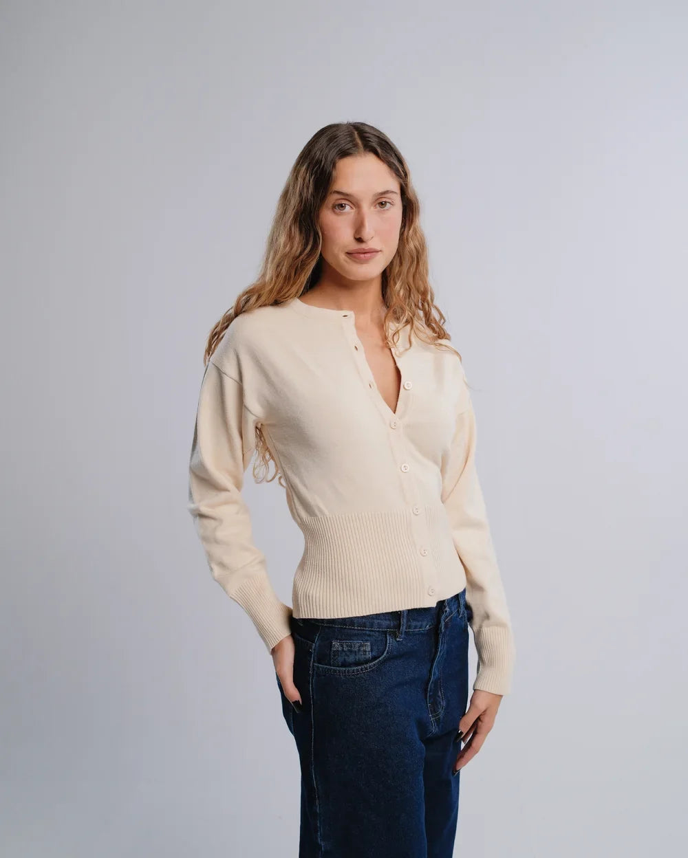 Fitted Cardigan in Cream — studio photograph