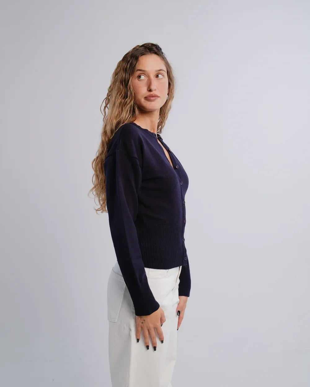 Fitted Cardigan in Navy — studio photograph