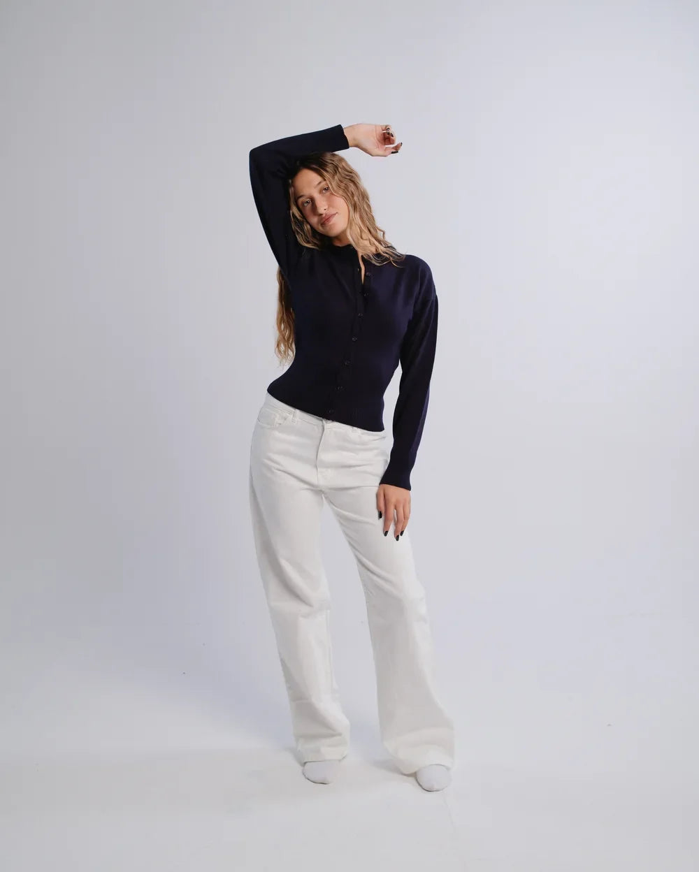 Fitted Cardigan in Navy — studio photograph
