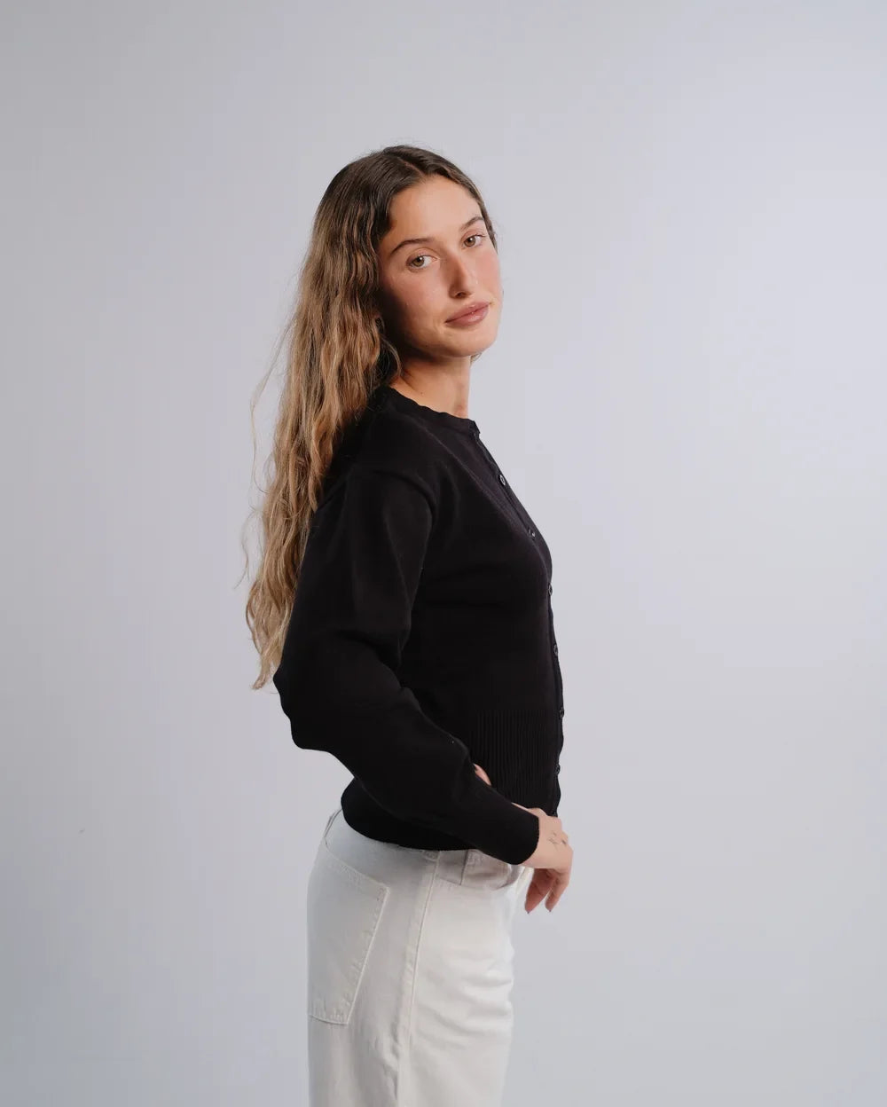 Fitted Cardigan in Black — studio photograph