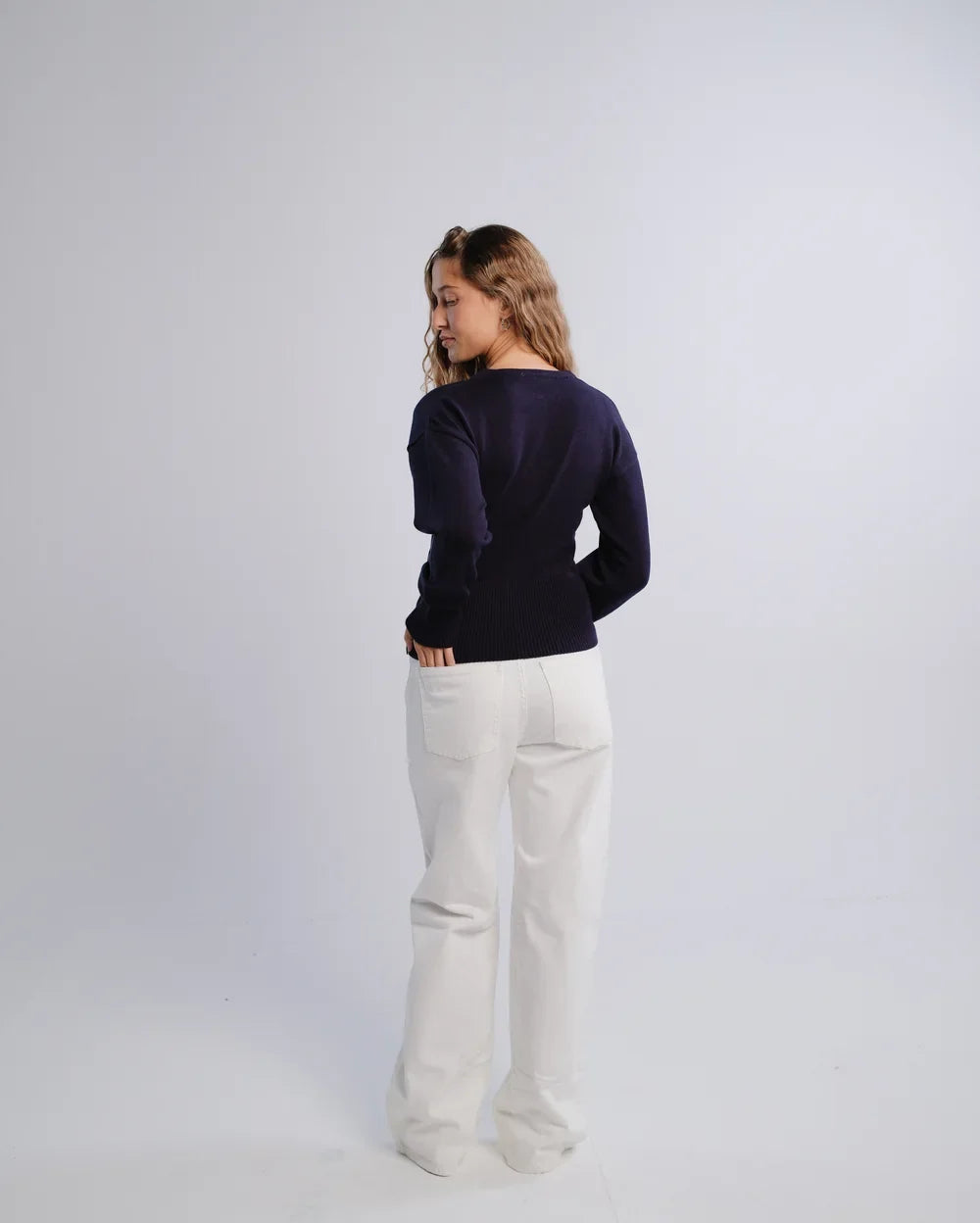 Fitted Cardigan in Navy — back view